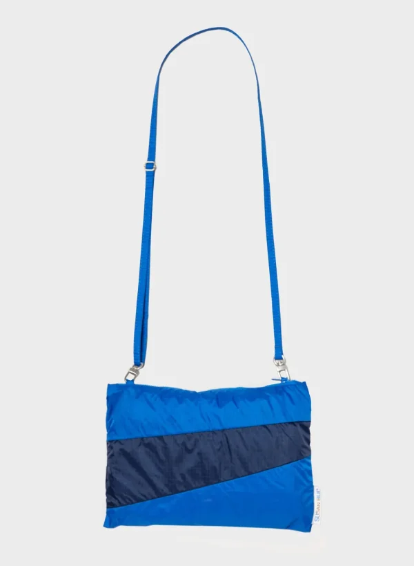 SUSAN BIJL < The New Raincoat