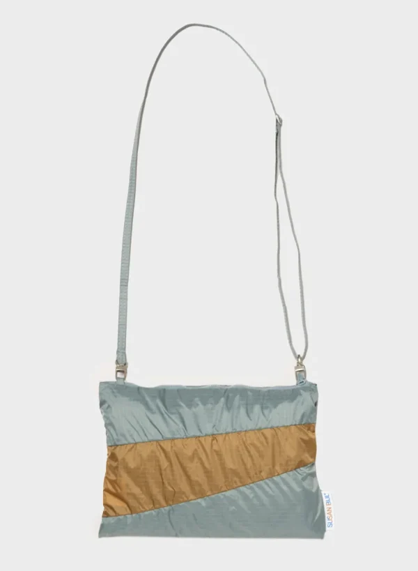 SUSAN BIJL < The New Raincoat