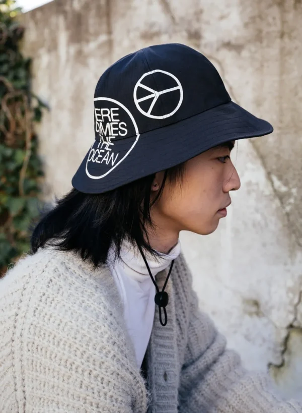 SUSAN BIJL < The New Rain Cap